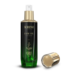 Serine Botanical Hair Oil with the cap off, showing the gold pump
